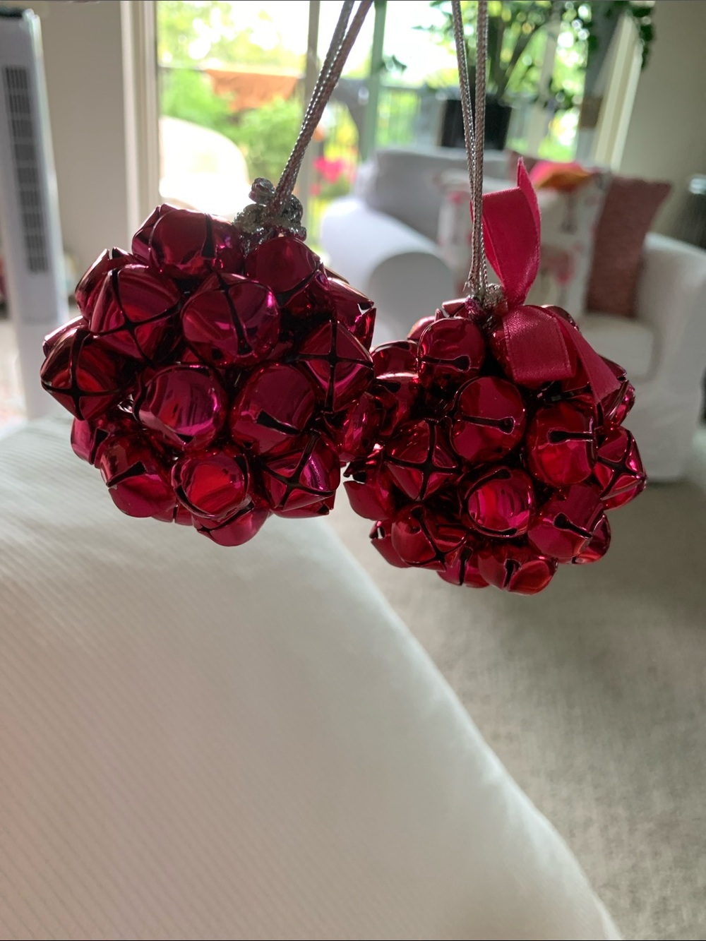 2 Festive Pink Jingle Bell Pom Poms
